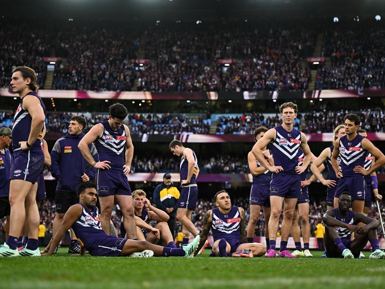 MELBOURNE, AUSTRALIA - SEPTEMBER 26: The Dockers reflect after the loss during the AFL Grand Final match between the Fremantle Dockers and the Brisbane Lions at the Melbourne Cricket Ground on September 26, 2026 in Melbourne, Australia. (Photo by Daniel Carson/AFL Photos) Daniel Carson