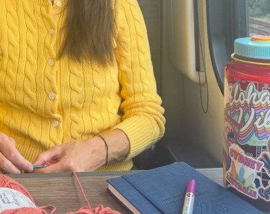 Sutton’s red plastic waterbottle is adorned with stickers, including one from Hugh’s hometown of Sydney, Australia.
