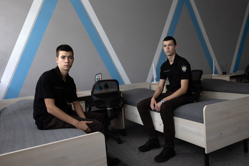 Twin brothers Viktor, left, and Vitalii. Their father died on the front lines.