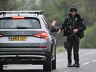 A police roadblock  outside RAF Fairford base in Fairford, south-west England.