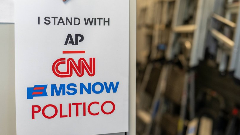 A sign in support of the banned outlets near the James S. Brady Press Briefing Room of the White House.