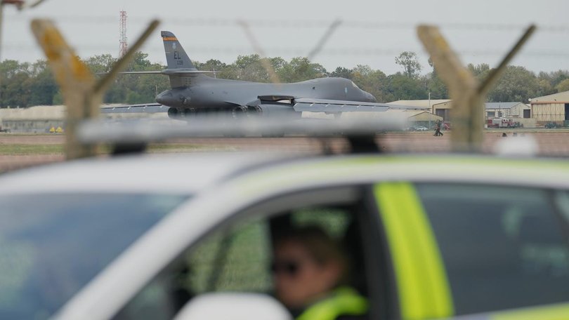 UK police say a quantity of petrol but no explosive devices were found in three vans that sparked a major security alert near an air base used by the US.