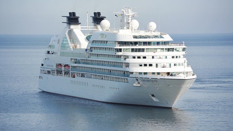 A woman accused of leaving her four young children at home alone to go on a three-day cruise has faced court.