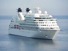 A  woman accused of leaving her four young children at home alone to go on a three-day cruise has faced court.