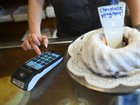 A surcharge ban is a win for consumers but another hit to dwindling profit margins for businesses. (James Ross/AAP PHOTOS)