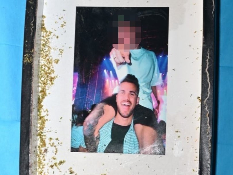 A framed photo of Mr Baird was found in the bin. Picture: NewsWire Handout