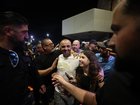 Yaniv Hayun, the plumber who helped incapacitate the attacker on the flydubai aircraft bound for Israel from the United Arab Emirates, welcomed after arriving at the Ben Gurion International Airport.