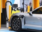 A fuel retailer has announced plans to buy one of nation's largest EV charging networks. (Jono Searle/AAP PHOTOS)