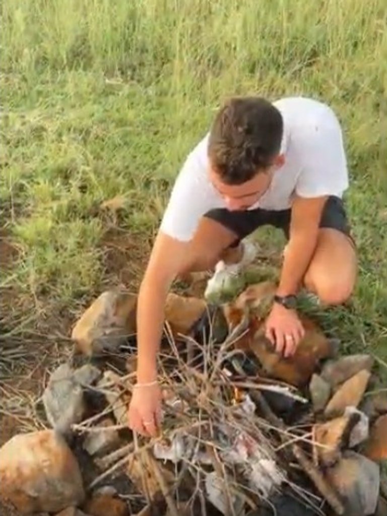 The video captures Mr Baird making a fire.