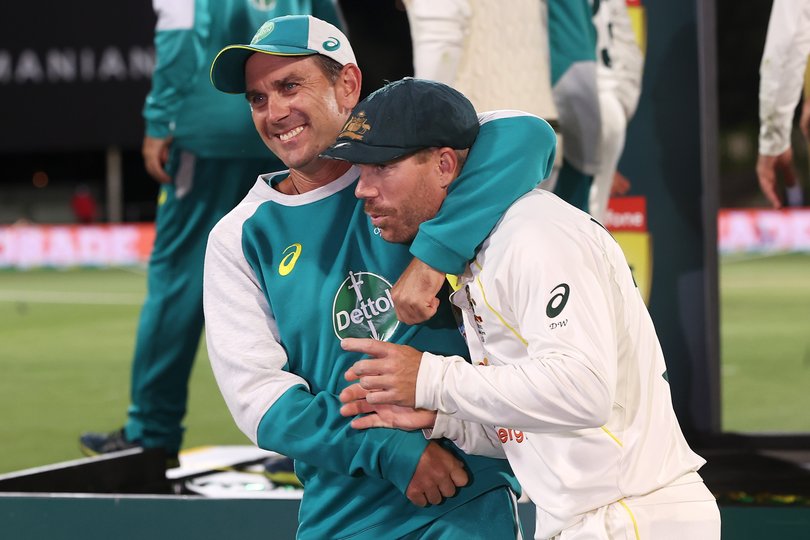 HOBART, AUSTRALIA - JANUARY 16: Australian coach Justin Langer and David Warner of Australia celebrate victory during day three of the Fifth Test in the Ashes series between Australia and England at Blundstone Arena on January 16, 2022 in Hobart, Australia. (Photo by Mark Kolbe - CA/Cricket Australia via Getty Images)