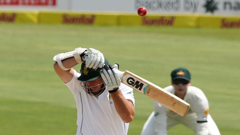 Graeme Smith of South Africa plays a shot to get out against Mitchell Johnson.