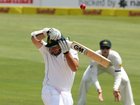 Graeme Smith of South Africa plays a shot to get out against Mitchell Johnson.