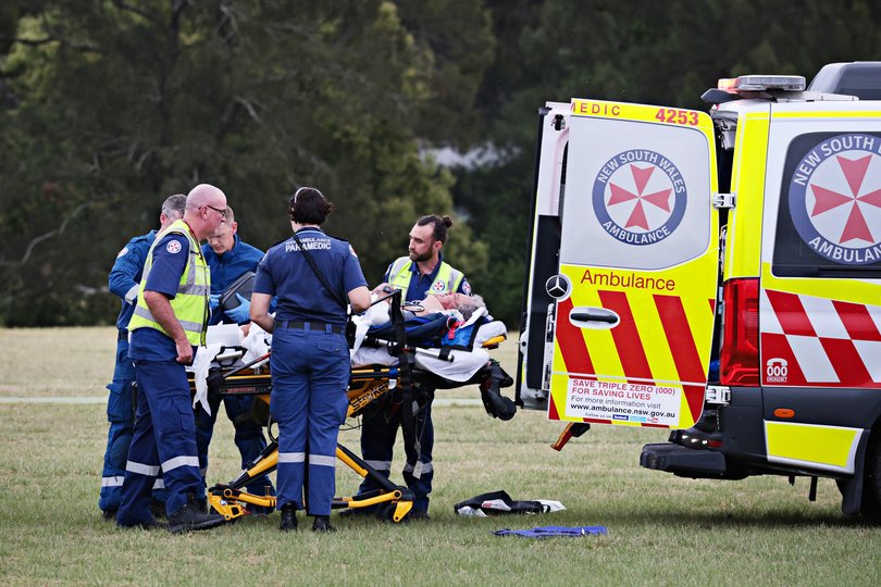 Ambulance with victims of an accident on Link Rd, Newcastle.