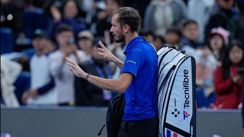 Daniil Medvedev leaves the court in Beijing after being disqualified against Novak Djokovic. (AP PHOTO)