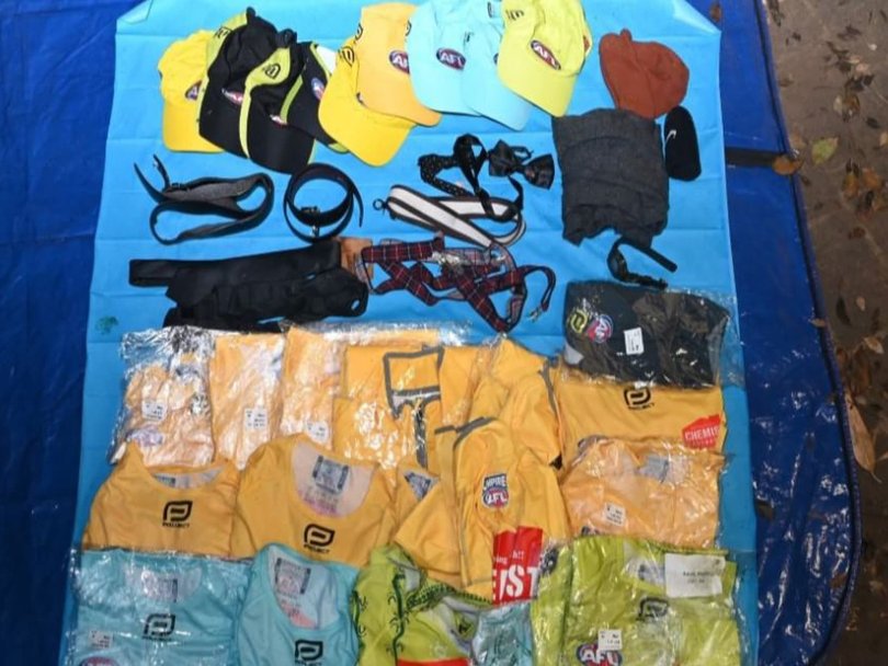 AFL merchandise was found in the skip bin. Picture: NewsWire Handout