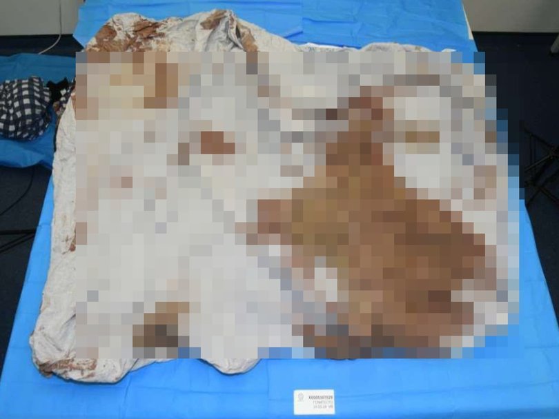 A bloodied quilt was found in the skip bin. Picture: NewsWire Handout