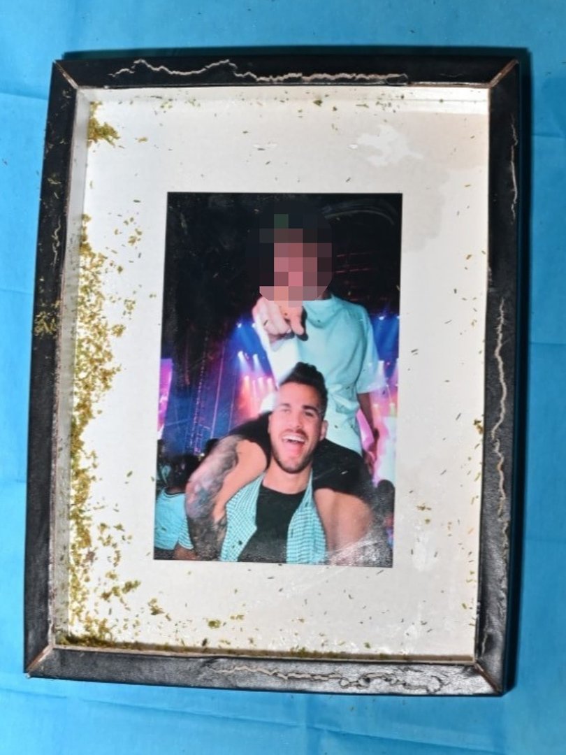 A framed photograph of Mr Baird was found in the skip bin. Picture: NewsWire Handout