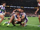 Billy Smith scores for the Roosters. 