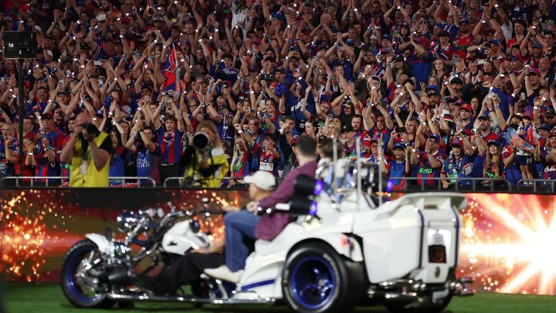 Fans rose as one during the lap.