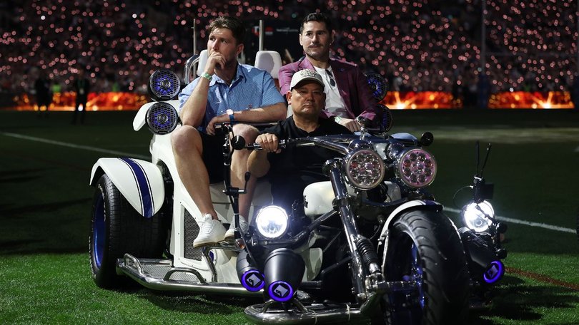 The pair were driven around the field.