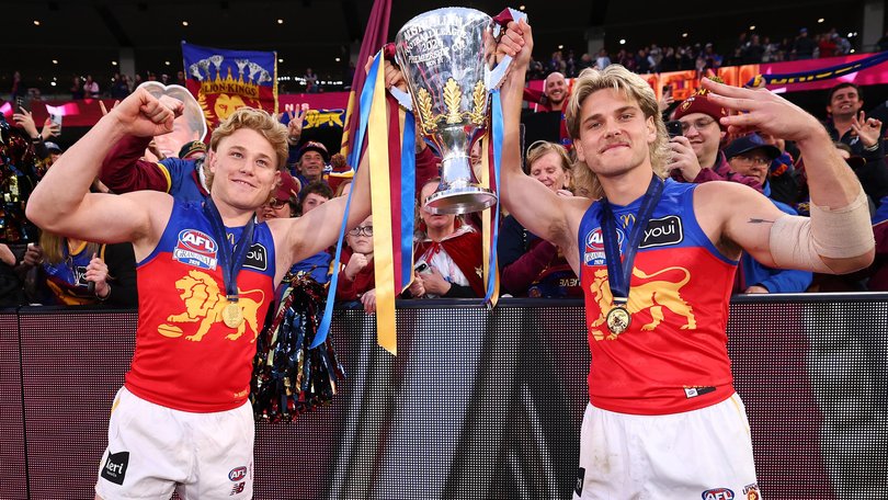 MELBOURNE, AUSTRALIA - SEPTEMBER 26: Levi Ashcroft and Will Ashcroft of the Lions celebrate with the Premiership Cup after the AFL Grand Final match between Fremantle Dockers and Brisbane Lions at Melbourne Cricket Ground, on September 26, 2026, in Melbourne, Australia. (Photo by Daniel Pockett/AFL Photos/via Getty Images) Daniel Pockett/AFL Photos