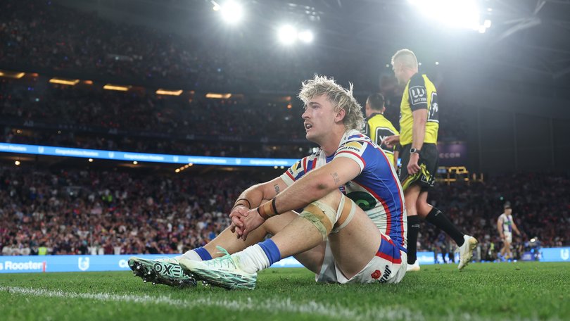 Fletcher Sharpe of the Knights looks dejected after a loss following the NRL Grand Final match between the Sydney Roosters and Newcastle Knights.