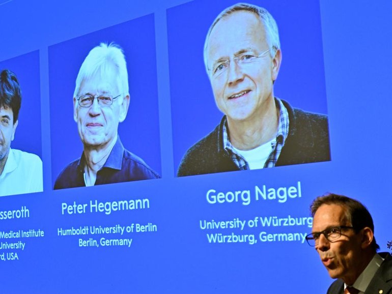 Karl Deisseroth, Peter Hegemann and Georg Nagel were announced Nobel winners at in Stockholm. (AP PHOTO)