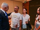 Israeli Prime Minister Benjamin Netanyahu meets with Yaniv Hayun, one of the passengers who averted the hijacking of the Flydubai jet.