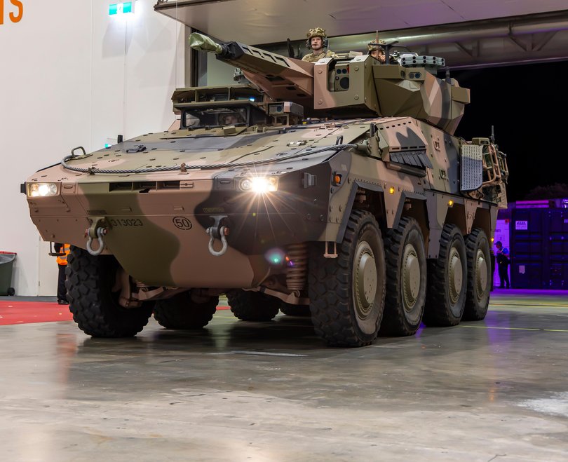 An Australian Army Boxer combat reconnaissance vehicle from the 2nd/14th Light Horse Regiment rolls into the Perth Exhibition and Convention Centre.