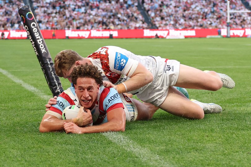 Mark Nawaqanitawase of the Roosters scores a try during the round eight NRL match between St George Illawarra Dragons and Sydney Roosters.