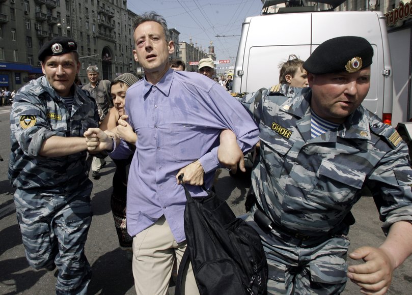 Peter Tatchell is grabbed by an OMON squad riot policeman during the attempted gay rights march in Central Moscow.