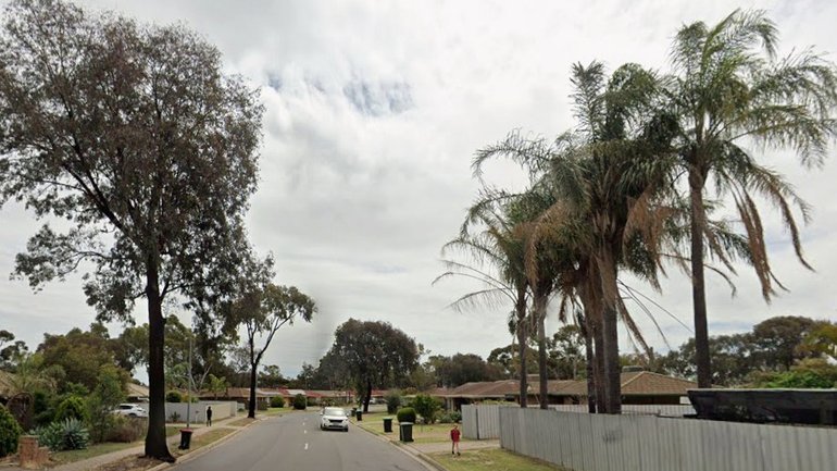 An 18-year-old man has been charged after allegedly picking up a young girl and carrying her away as she walked with family in Adelaide’s north.