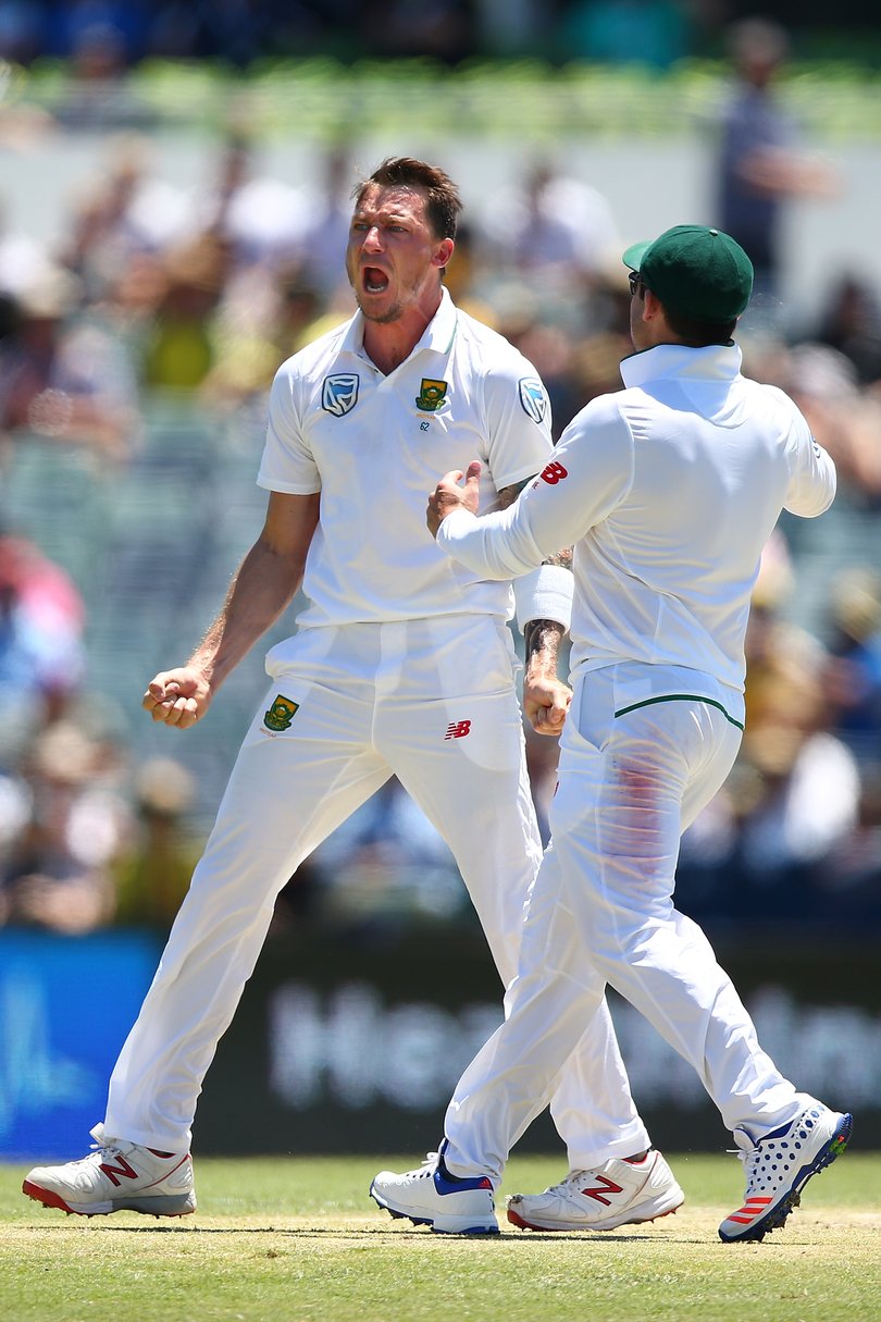 Dale Steyn of South Africa celebrates the wicket of David Warner.