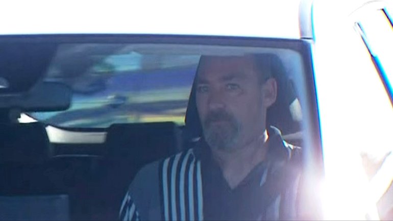 James Vlassakis was seen walking through the Adelaide Pre-release Centre car park before being driven away.