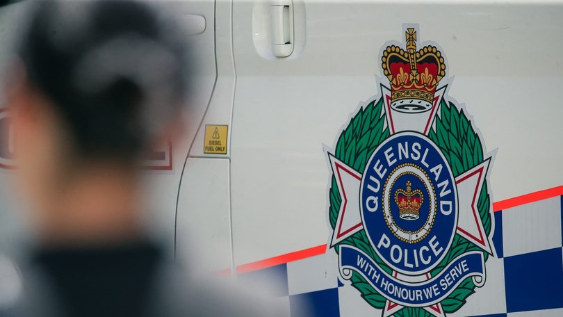 A woman and a child have died after their car rolled over into a dam.