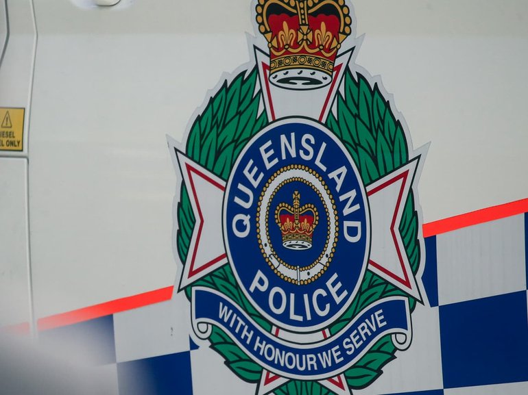 A woman and a child have died after their car rolled over into a dam.