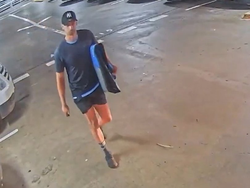 Mr Lamarre-Condon leaving Miranda Westfield after purchasing a surfboard bag hours after the alleged murders. 