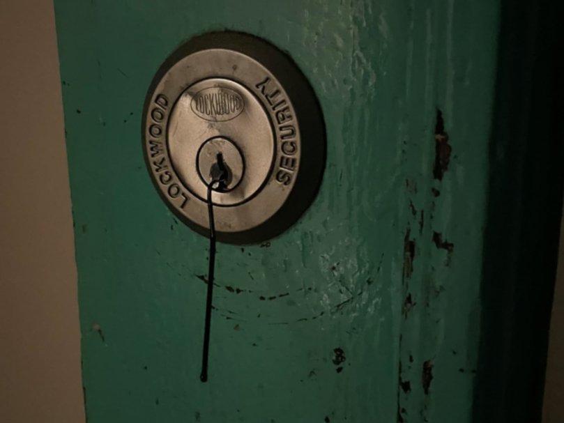 A picture of a bobby pin in Mr Baird’s door. 