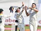 Australia celebrate the wicket of Ryan Rickelton.