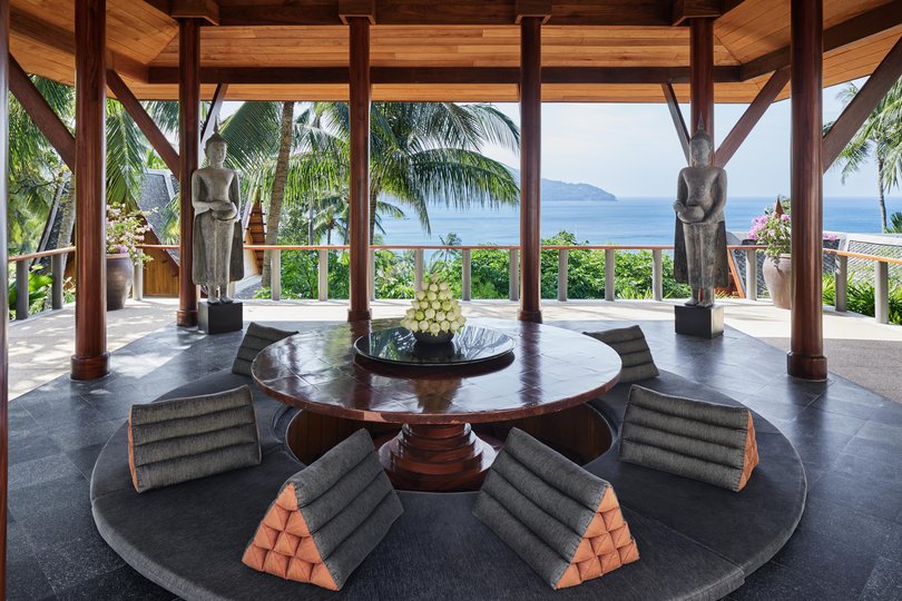 Secluded seating overlooking Andaman Sea.