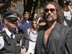 Russell Brand will stand trial for rape and sexual assault in a London court. (AP PHOTO)
