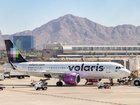 A young woman was found dead in her seat aboard a plane after fellow travellers began disembarking and realised she had not moved.