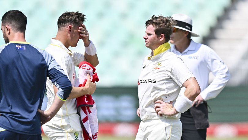 Steve Smith reacts after he got hit on the helmet from the bowling of Anrich Nortje.