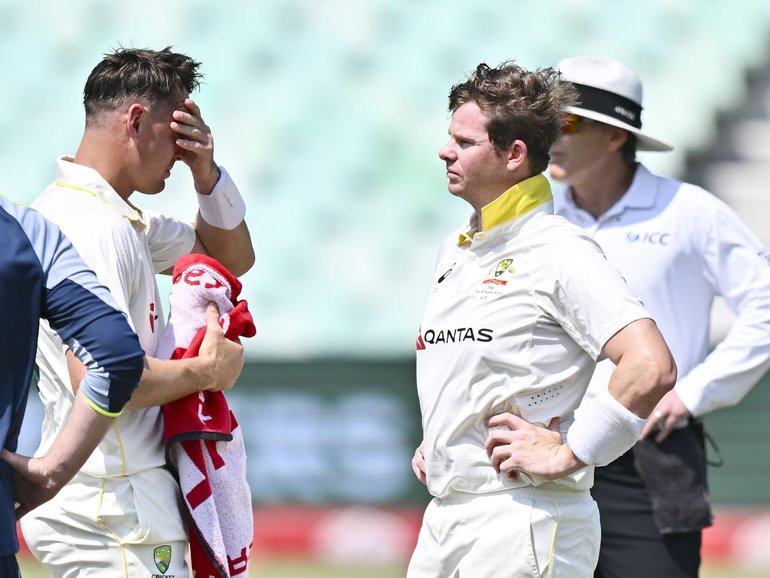 Steve Smith reacts after he got hit on the helmet from the bowling of Anrich Nortje.