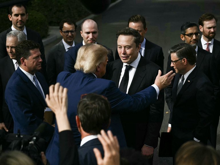 US President Donald Trump greets CEO of Tesla and SpaceX Elon Musk after a meeting with technology executives about artificial intelligence at the White House.