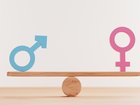 Blue man sign and pink woman sign on balance wooden seesaws for equal business human right and gender concept by 3d rendering.