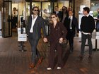 Russell Brand leaves court with his wife Laura Brand during his trial, where he faces rape and sexual assault charges at Southwark Crown Court on October 12 in London.