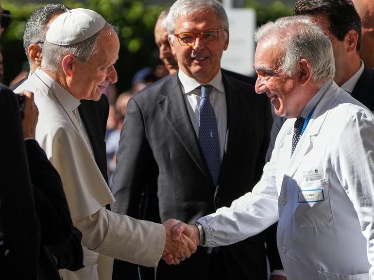 Gemelli hospital officials greeted Pope Leo as he walked through its main entrance. (AP PHOTO)