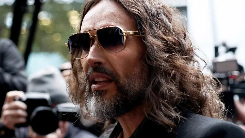 Russell Brand pranced around room like ‘Basil Fawlty’ before raping woman after Labour conference, court told Russell Brand pranced around room like ‘Basil Fawlty’ before raping woman after Labour conference, court told