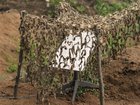  Starlink terminal camouflaged with a net near the eastern frontline in the Donetsk region of Ukraine in the summer of 2023. 